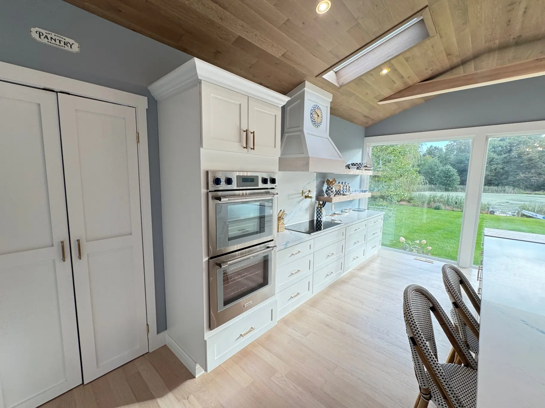 White Shaker cabinetry with premium stainless appliances in Doylestown kitchen remodel