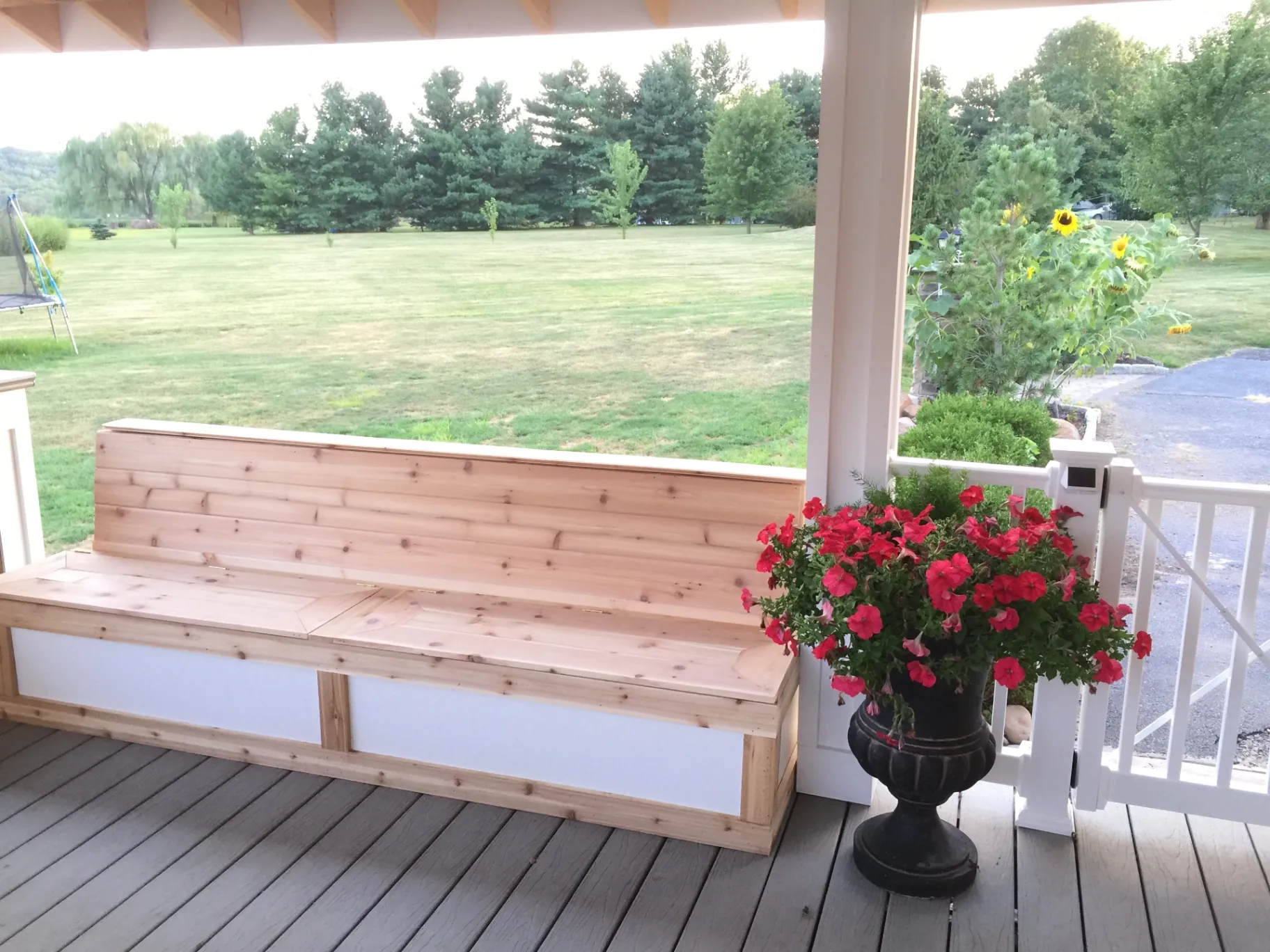 Covered porch with built-in cedar bench in Wayne, PA