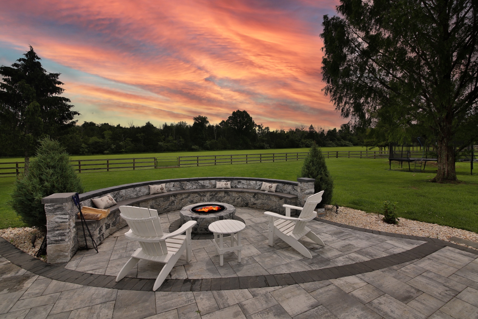 Stone fire-pit lounge & paver patio